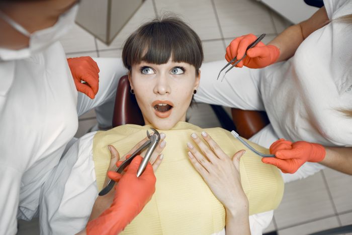 Young woman suffering from dental anxiety.