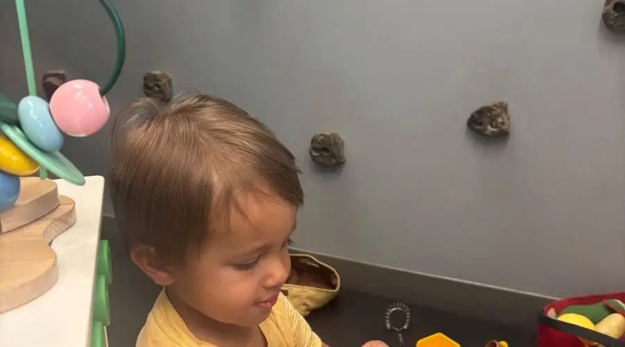 Child receiving an airway evaluation from a kids dentist