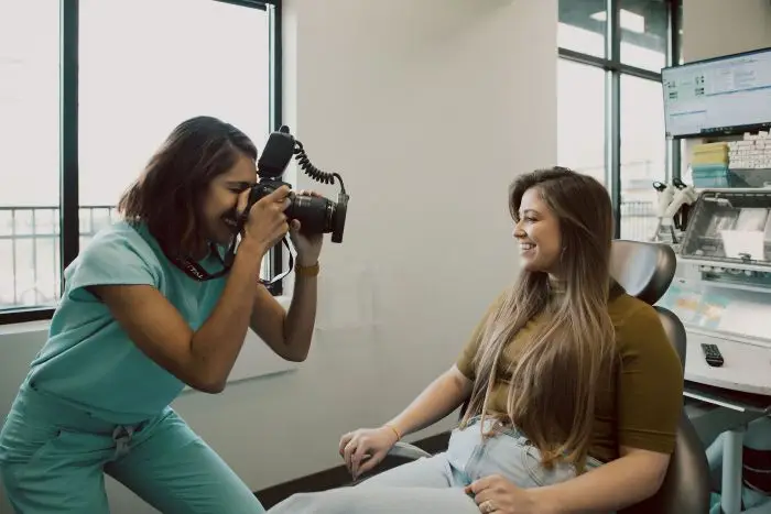 Woman at a dental clinic during a dental veneers consultation